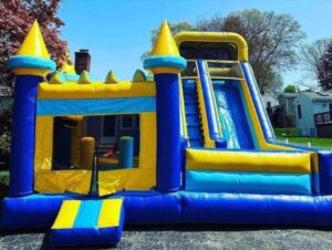 Blue castle bounce house and slide combo